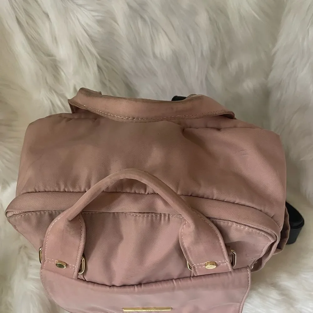 Steve Madden Nylon blush pink backpack with black embroidery back straps.